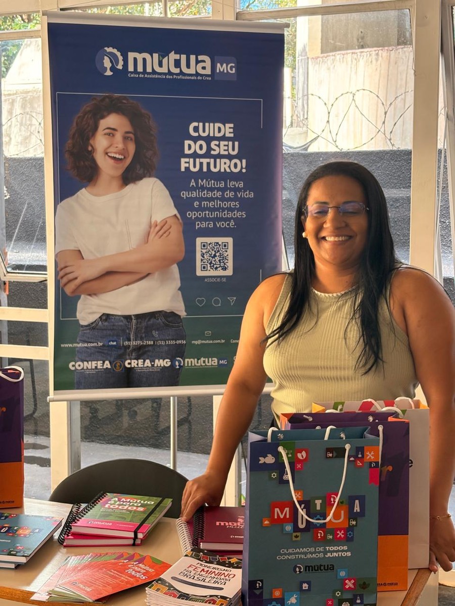 Estande da Mútua-MG no STEM Women Day Minas Gerais 2026, com banner e material institucional